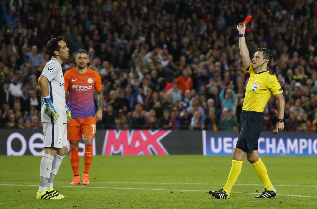 Football Soccer - FC Barcelona v Manchester City - UEFA Champions League Group Stage - Group C - The Nou Camp, Barcelona, Spain - 19/10/16 Manchester City's Claudio Bravo is shown a red card by referee Milorad Mazic Reuters / Albert Gea Livepic EDITORIAL USE ONLY.
