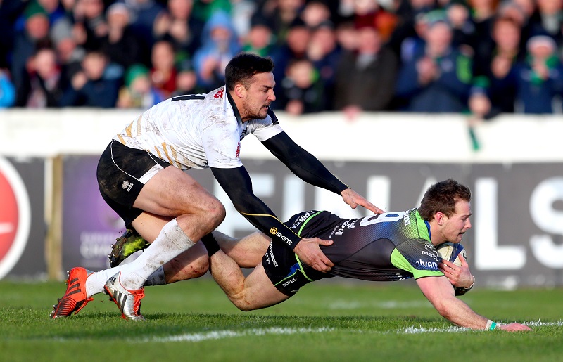 European Rugby Champions Cup Round 5, Sportsground, Galway 14/1/2017 Connacht vs Zebre Connacht's Kieran Marmion scores his sides ninth try despite Lloyd Greeff of Zebre Mandatory Credit ©INPHO/James Crombie