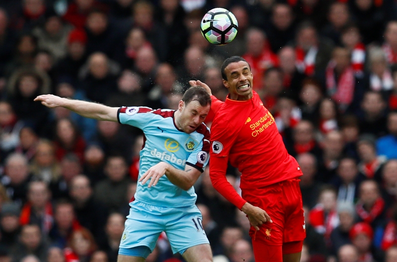 Britain Football Soccer - Liverpool v Burnley - Premier League - Anfield - 12/3/17 Burnley's Ashley Barnes in action with Liverpool's Joel Matip  Action Images via Reuters / Jason Cairnduff Livepic EDITORIAL USE ONLY. No use with unauthorized audio, video, data, fixture lists, club/league logos or "live" services. Online in-match use limited to 45 images, no video emulation. No use in betting, games or single club/league/player publications.  Please contact your account representative for further details.