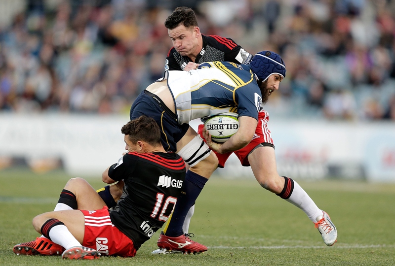 Super Rugby, GIO Stadium, Canberra 13/6/2015 Brumbies vs Crusaders Scott Fardy of the Brumbies is tackled Mandatory Credit ©INPHO/Photosport/Mark Metcalfe
