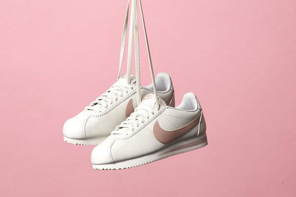 Women's White & Pink Nike Cortez Trainers
